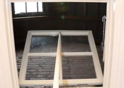 Hinged glass loft hatch in victorian homeGlass loft hatch in Victorian home