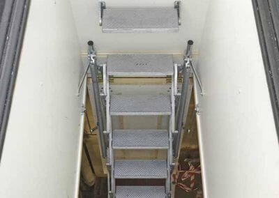 Retractable roof access ladder and hatch. Providing access for maintenance of roof top equipment. Premier Loft Ladders case study