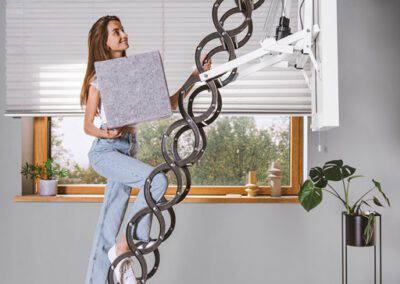 FAKRO LET remote controlled scissor loft ladder in use within a domestic application