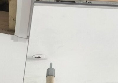 Insulated timber loft ladder with discrete recessed opening mechanism.